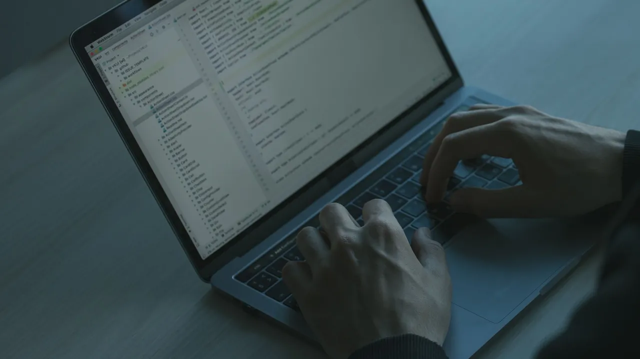 how to use midjourney programmatically — coding on a laptop to build an automated image generation workflow